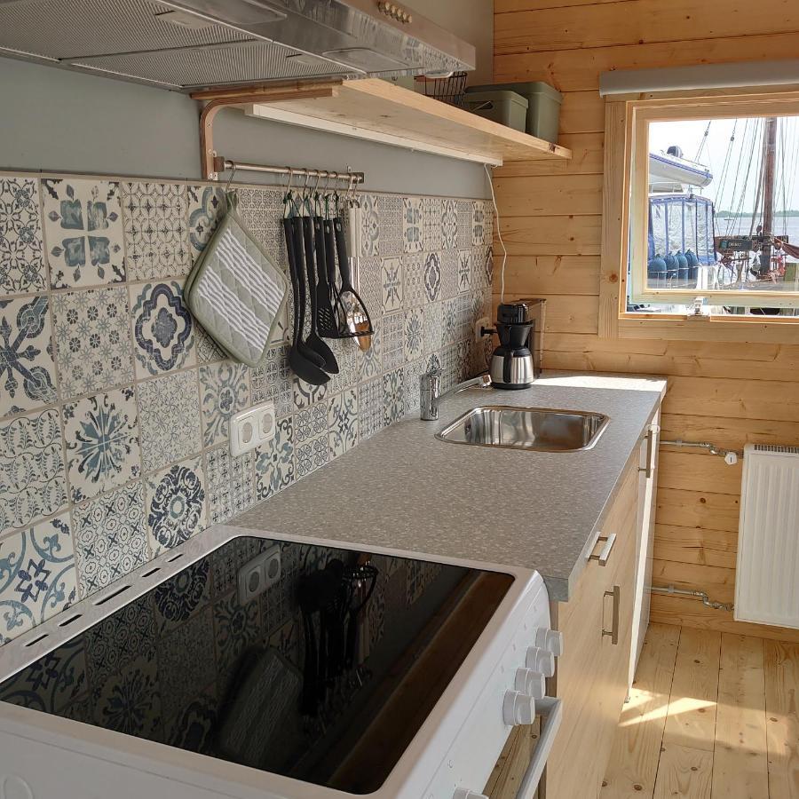 Waterhuisjes Op De Pier Lauwersmeerplezier! Сasa de vacaciones Lauwersoog